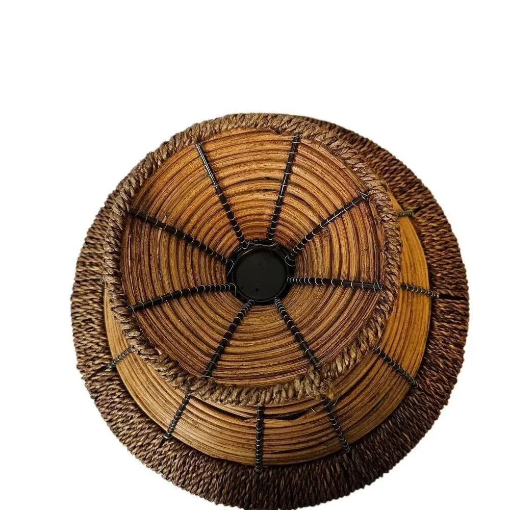 Handwoven vintage wicker ratton pedestal bowl/basket with footed base.